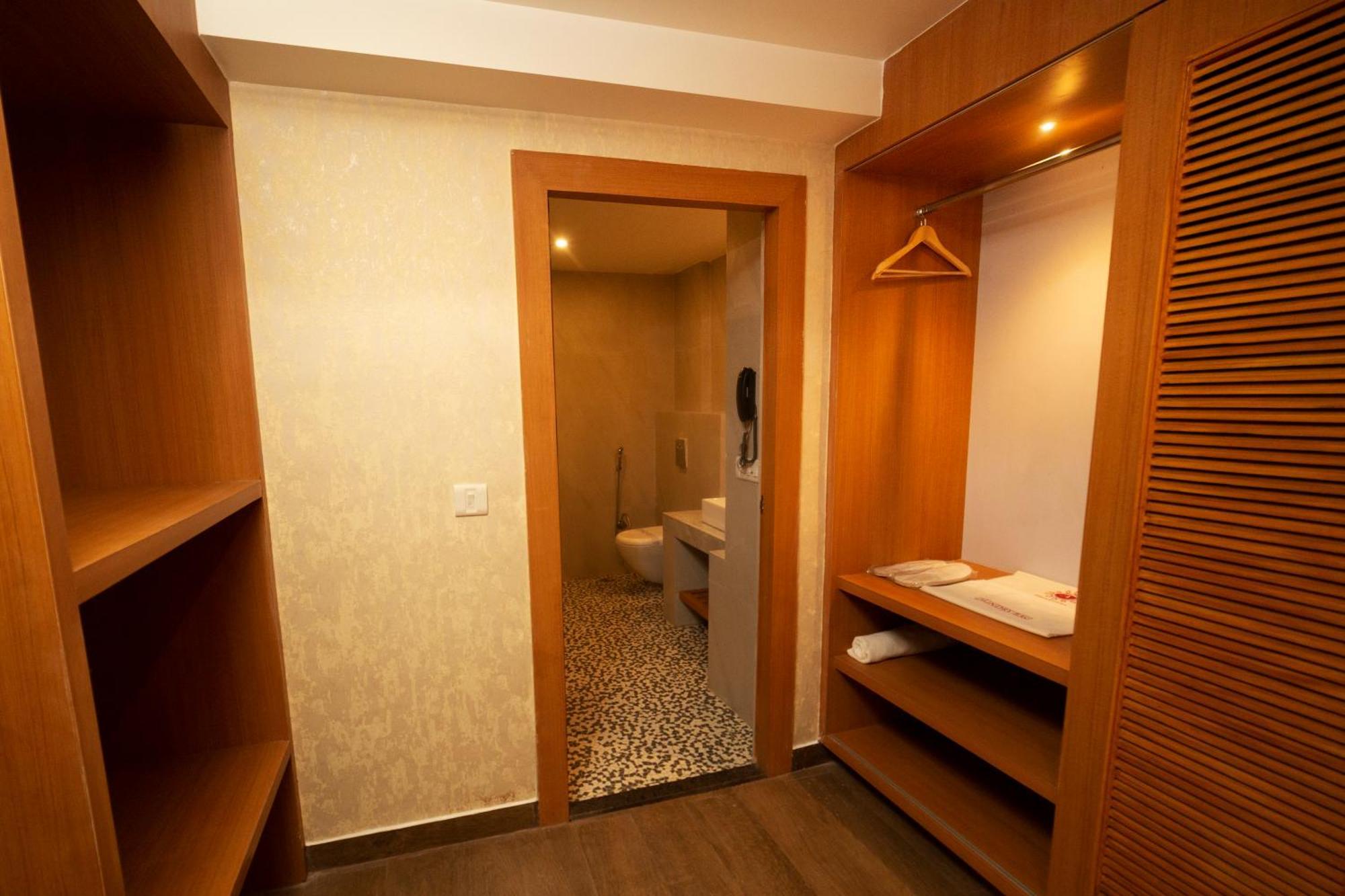 Royal Suites Living Area & Balcony Sit-out on Laundry Services | on Full Body Spa Massage