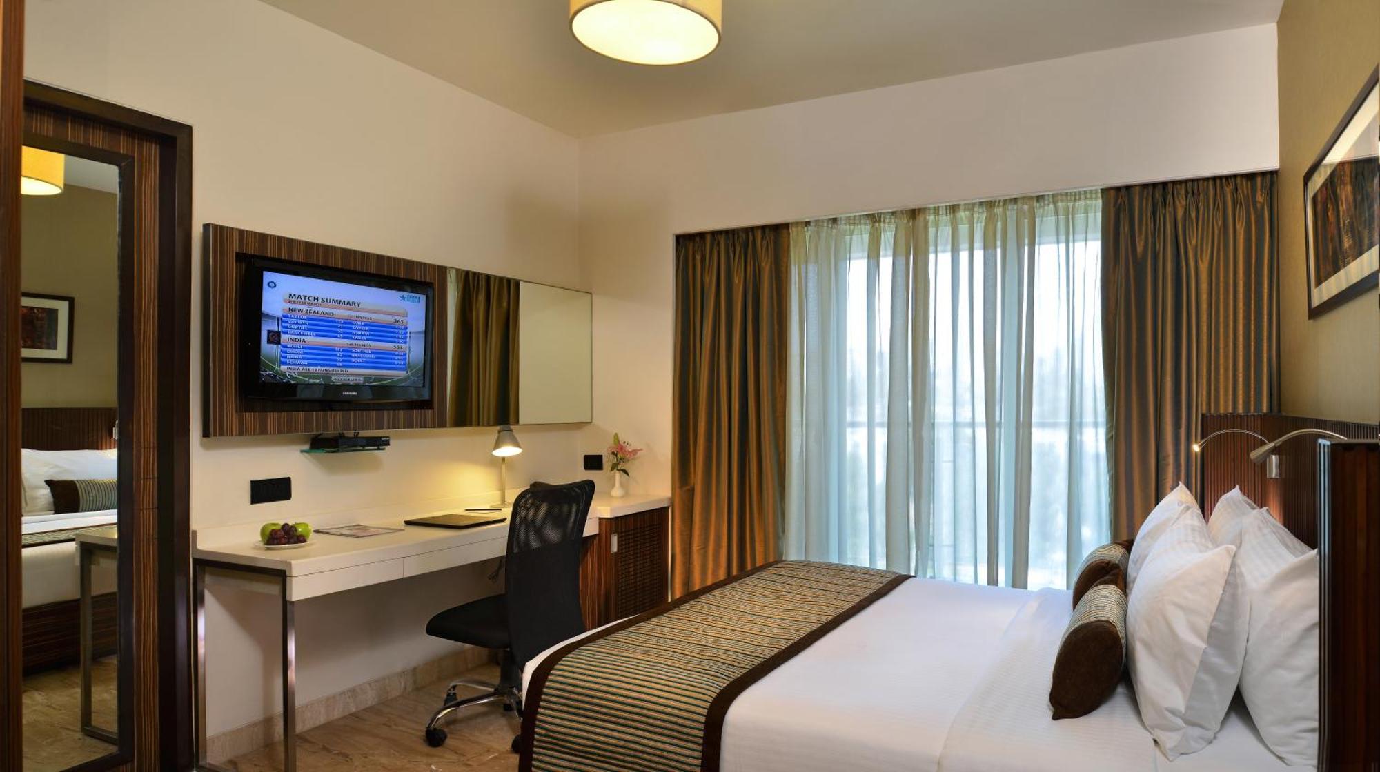 Deluxe Room 1 Double Bed on Food & Beverages Services on Two way Airport Transfer Laundry Services,1329304796:JPEG