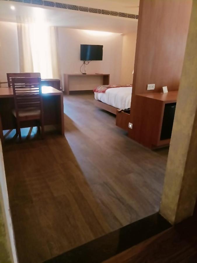 Royal Suites Living Area & Balcony Sit-out on Laundry Services | on Full Body Spa Massage
