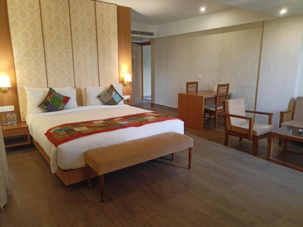 Royal Suites Living Area & Balcony Sit-out on Laundry Services | on Full Body Spa Massage