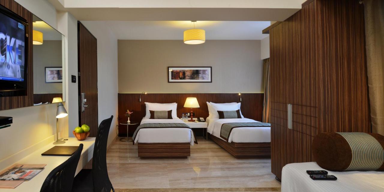 Deluxe Room 2 Twin Beds on Food & Beverages Services on Two way Airport Transfer Laundry Services,1329304832:JPEG