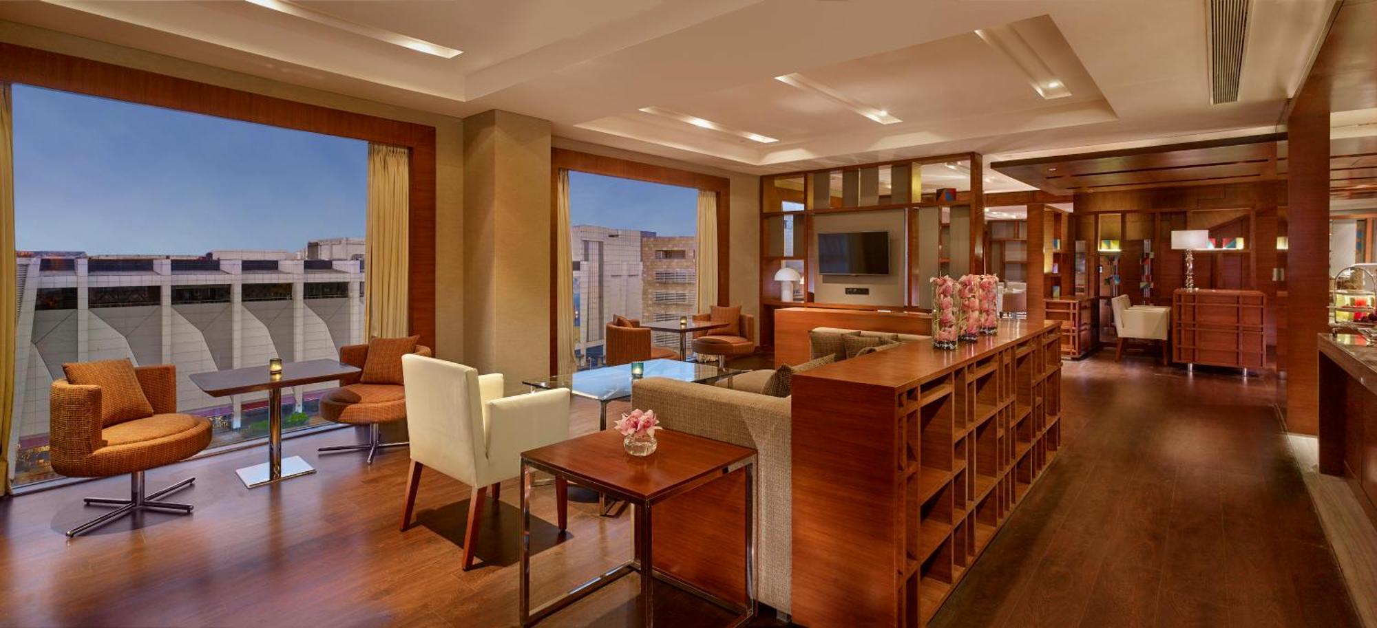 King Bed Bathtub & Club Access Unlimited Complimentary IMFL beverages from 1800 HRS to 2000