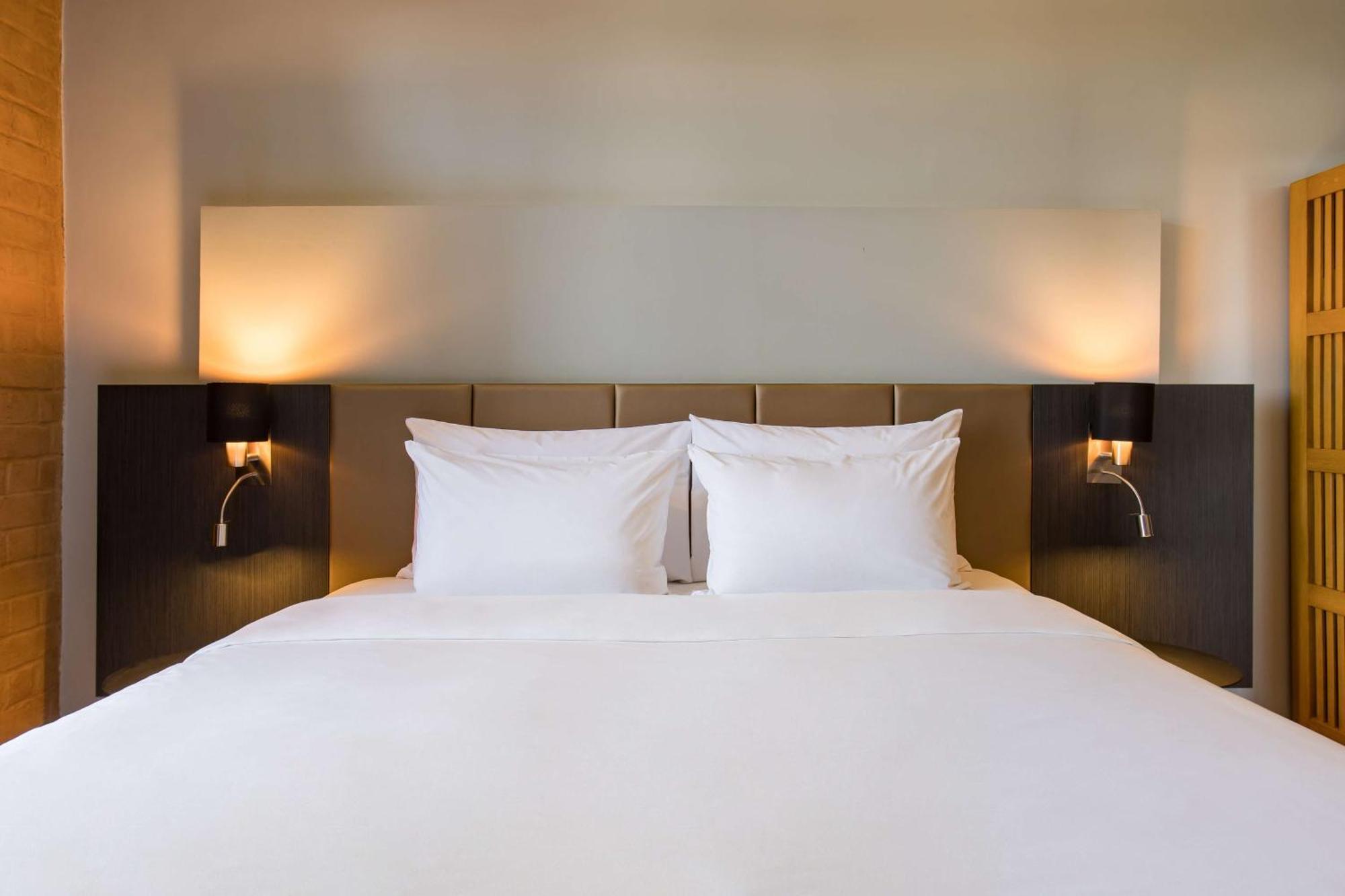 Business Class with Happy Hours 01:00 PM to 06:00 PM 1+1 , one way Airport Transfers and Free Pick up and drop to Worldmark Aerocity (subject to car availability)