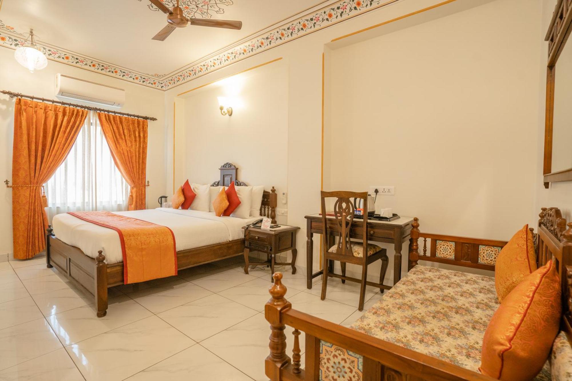 Royal Deluxe Room: Enjoy use of the new rooftop swimming pool, kids stay complimentary, secure gated parking, and a dedicated travel desk to assist with local sightseeing tours, intercity travel arrangements, and exciting activities,1633006471:JPEG
