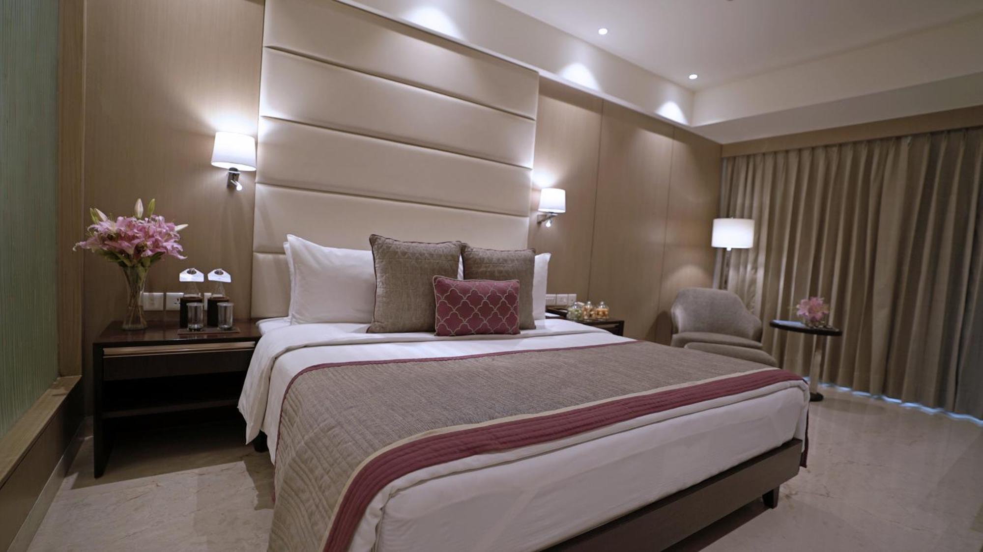 Executive Room alcoholic or non alcoholic house drinks a platter of Fruits Cookies 01 way airport transfers on food & soft beverages complimentary sauna steam once during the