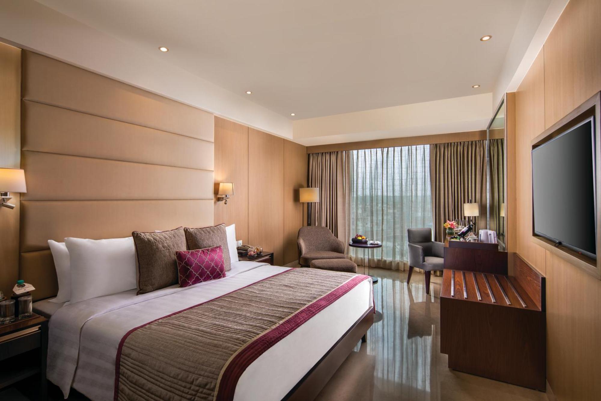Executive Room alcoholic or non alcoholic house drinks a platter of Fruits Cookies 01 way airport transfers on food & soft beverages complimentary sauna steam once during the