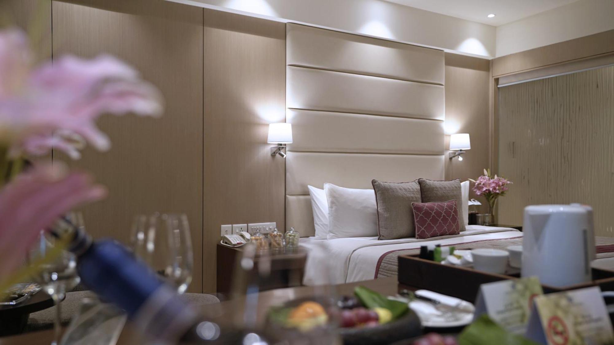 Executive Room alcoholic or non alcoholic house drinks a platter of Fruits Cookies 01 way airport transfers on food & soft beverages complimentary sauna steam once during the