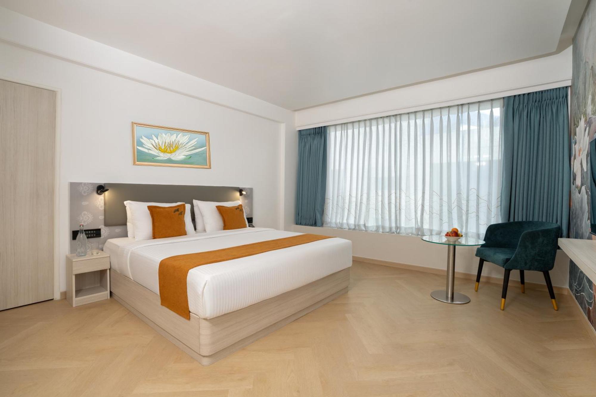 Premium Room King Bed with Breakfast and 15% Discount on F&B and Complimentary Airport Transfer,1697868493:JPEG