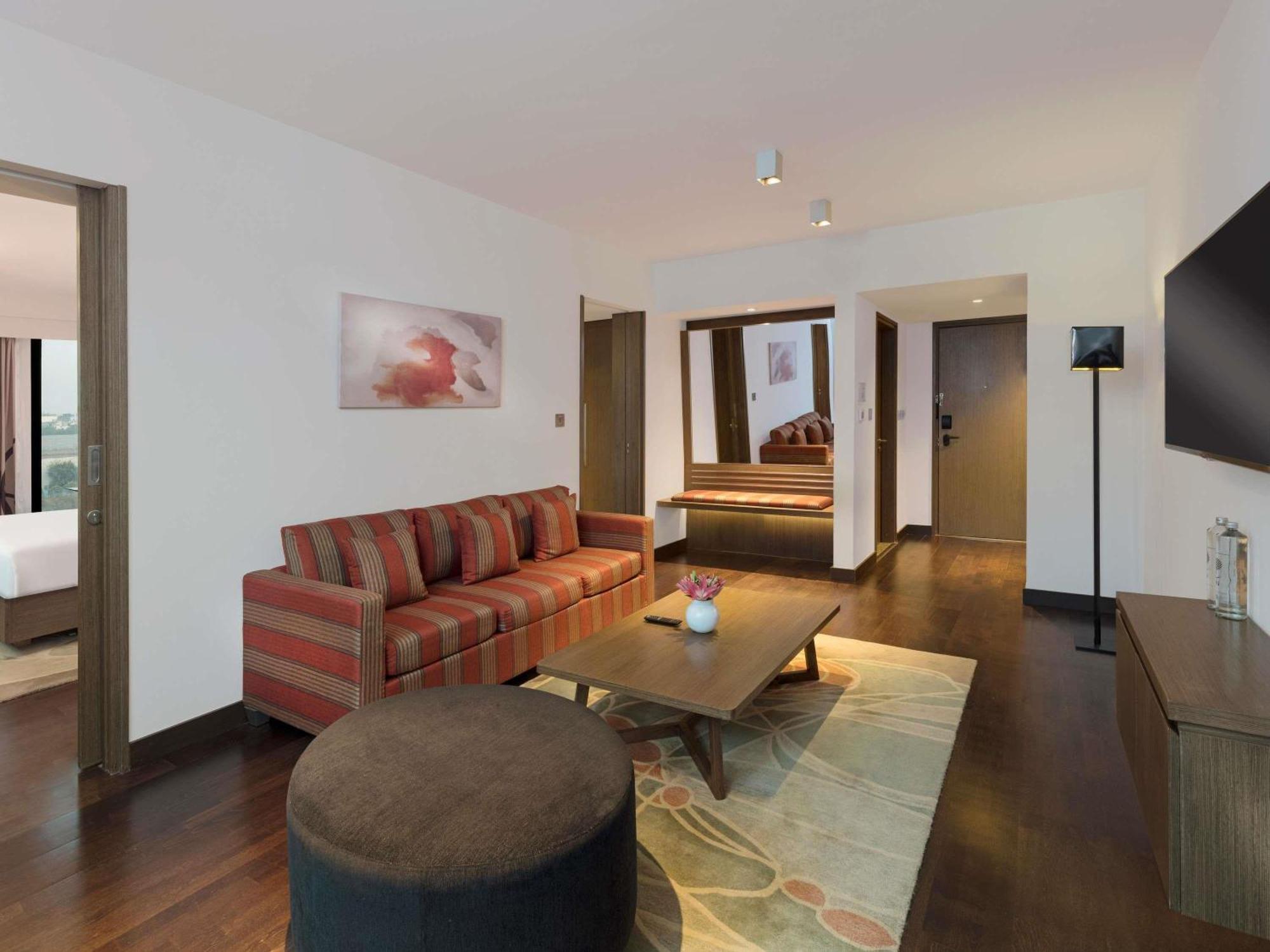 Superior Suite with Pool View -2 Way Airport Transfers, Lounge Access, 20% off on F&B and Laundry