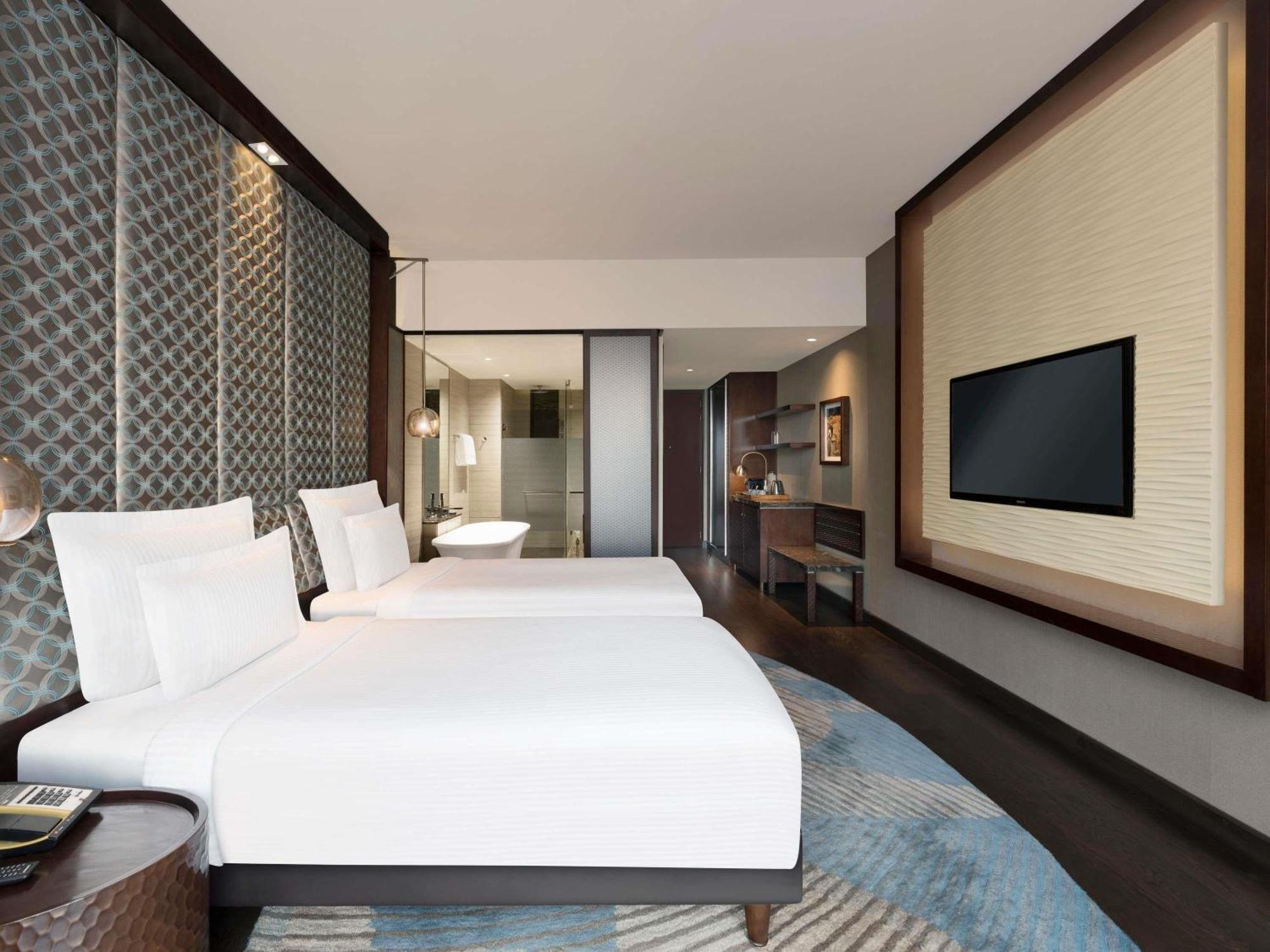 Executive Twin Room - Pool Side with 20% discount on food, beverages, spa and laundry | Complimentary one way airport transfer | Lounge access and cocktail hours