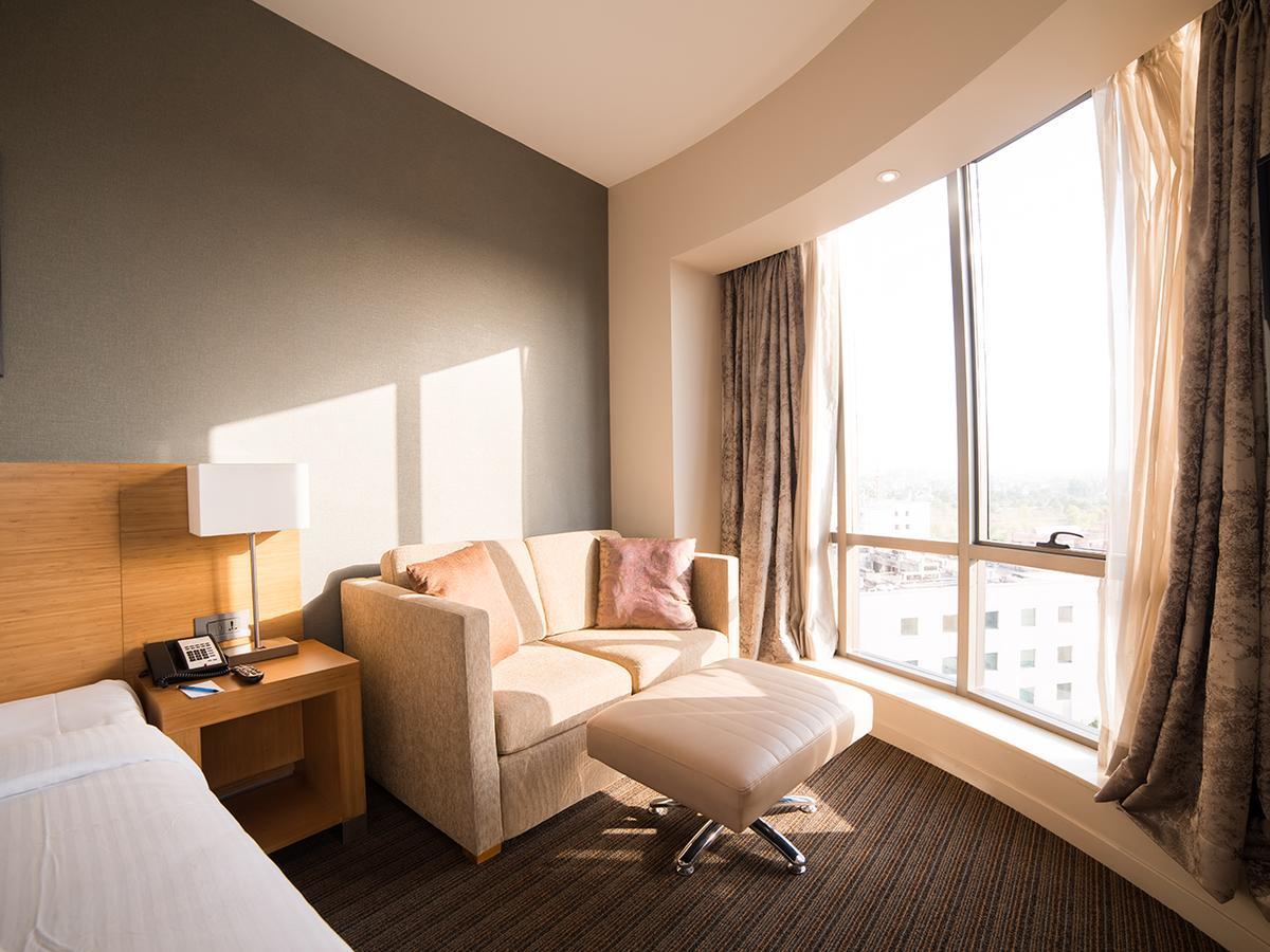 Executive Room | Unlimited IMFL at the Premium Lounge from 6–8 pm, one-way airport transfer, and 20% discounts on F&B, Laundry, Spa, and Transport
