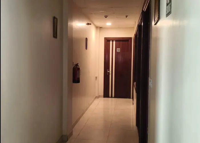 Hotel Ncr & Cafe